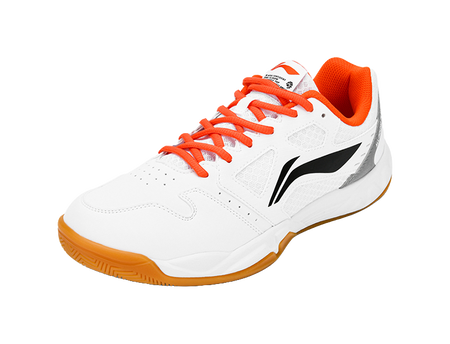 White badminton shoe with orange laces, black side logo, and textured upper