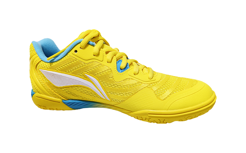 Yellow table tennis shoe with blue trim, white side logo, and lace-up upper
