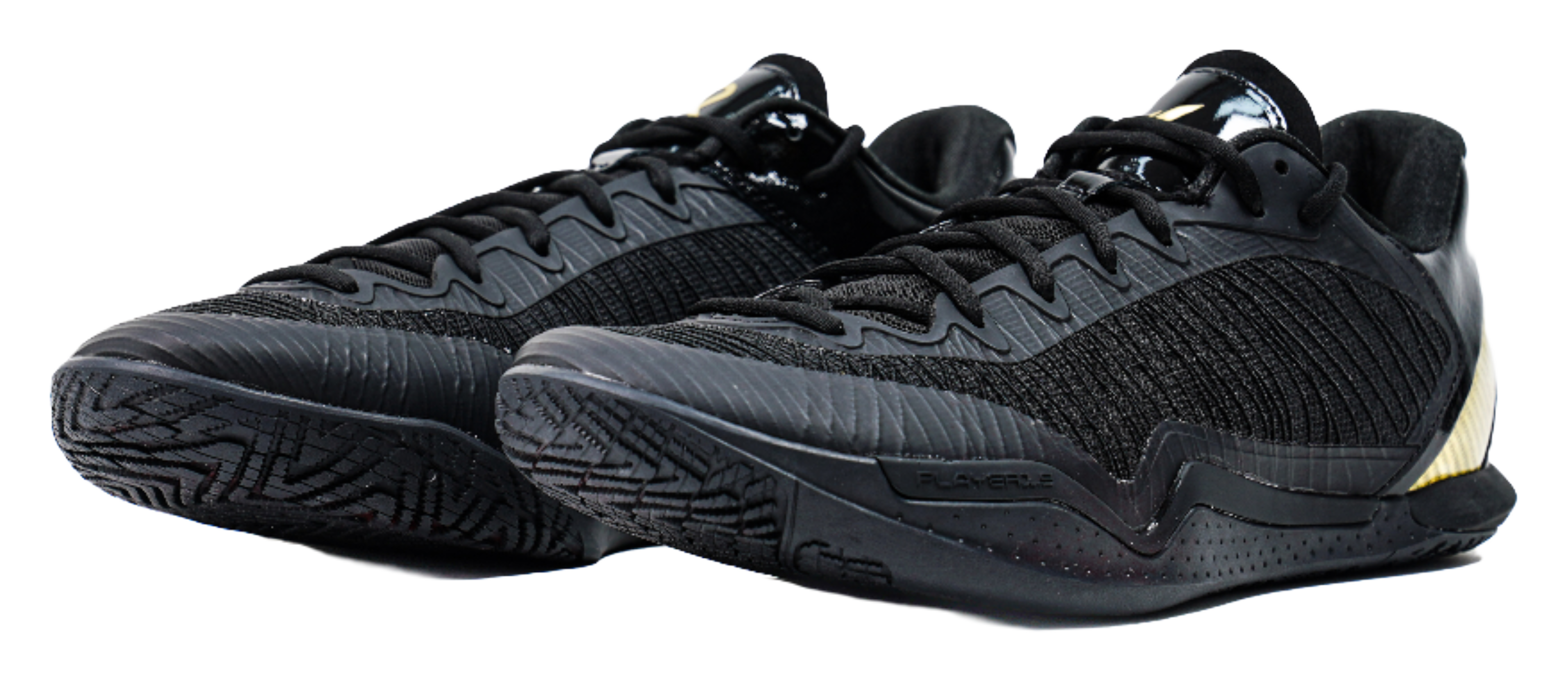 Black low-cut lace-up basketball shoe with textured knit upper and detailed outsole
