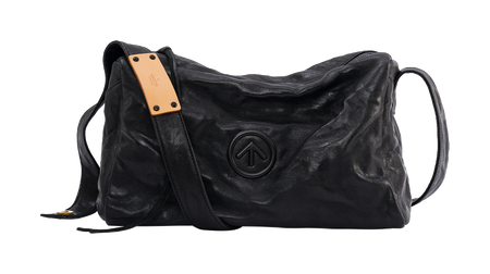 GROTTO black pleated sheepskin crossbody bag with tan label and embossed dark logo