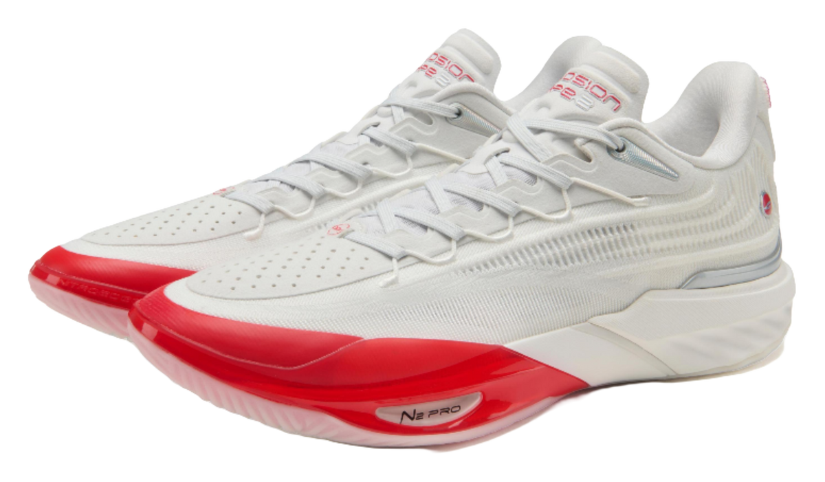 Unisex basketball shoe, white knit with red accent sole and lace-up front