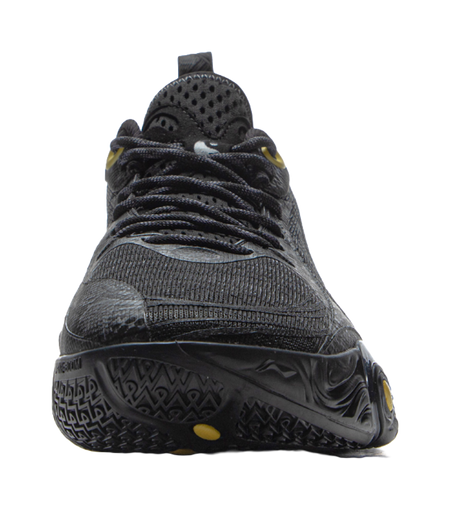 Black basketball shoe with laces, perforated toe, and gold vertical accents