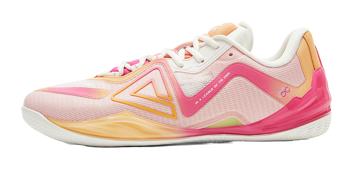 Pink basketball shoe with white laces and mesh upper, orange accents, curved midsole