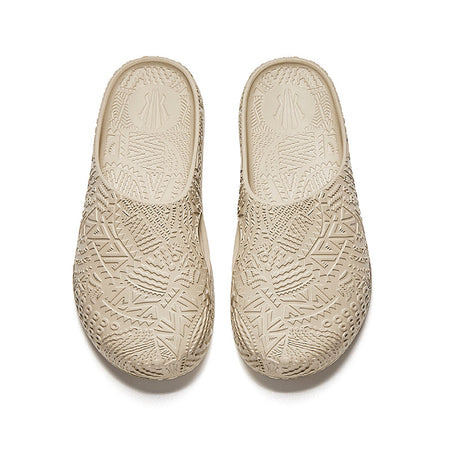 Pair of ANTA men's Hela slides, light beige insoles with molded traction pattern