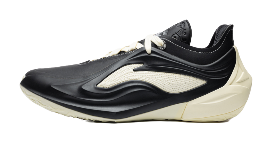 Men's low-top basketball shoes in black with cream accents, lace-up, sculpted sole