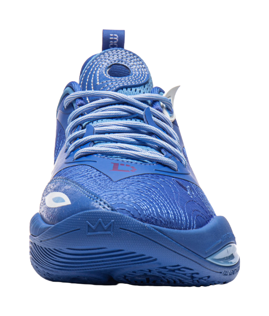 Blue basketball shoe with lace-up front and textured upper with side emblem detail