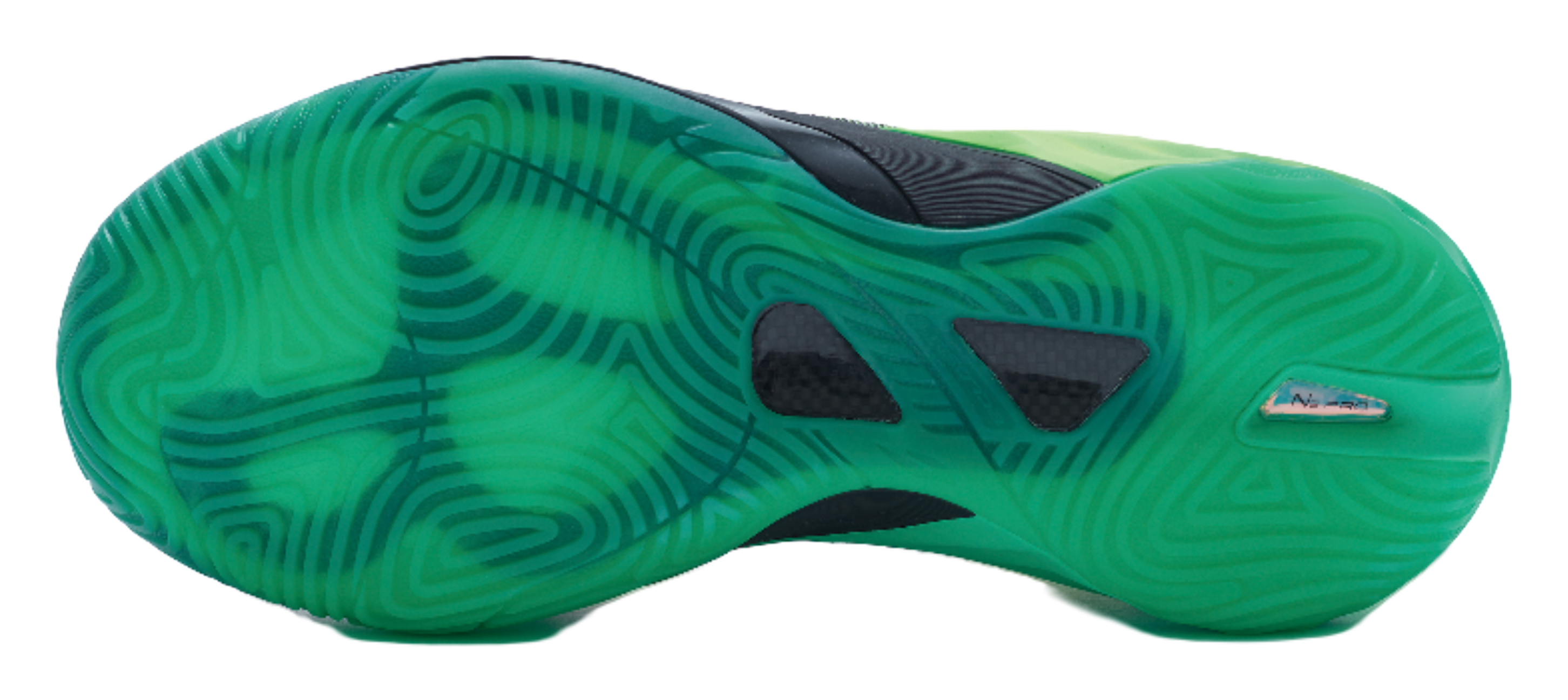 Green basketball shoe outsole with textured traction pattern and dark grip pods