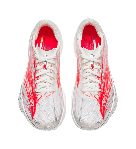 Women's low-top running shoes pair view, white upper with red interior lining