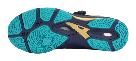 Table tennis shoe outsole in teal with textured traction pattern and dark blue trim