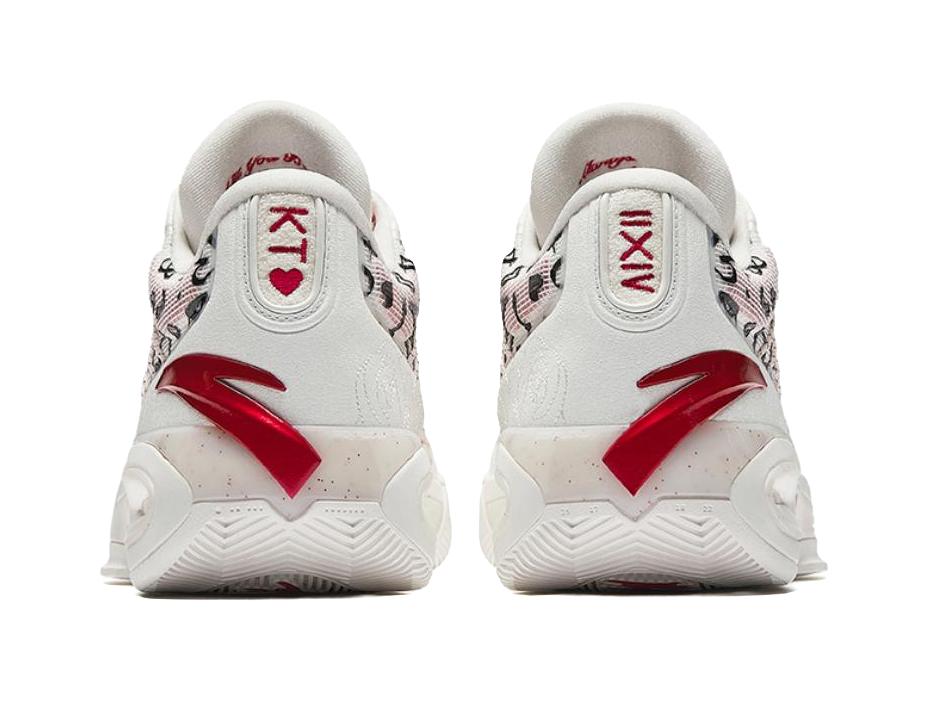 White basketball sneakers heel view with red logo and cushioned back tabs