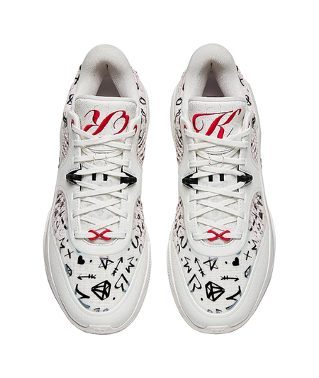 Pair of white lace-up basketball sneakers with black and red graphic uppers