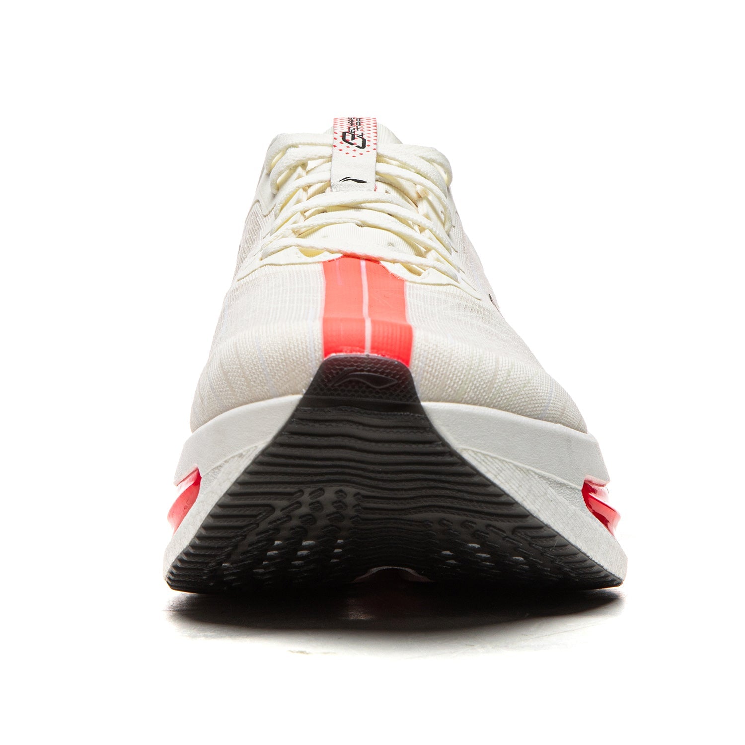 Champagne white running shoe with textured black outsole and red trim, sole view
