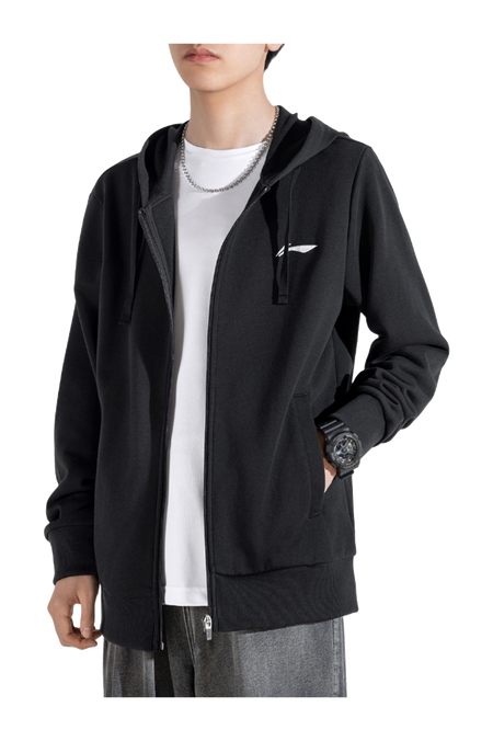 Men’s black zip-up hooded sweatshirt worn over white T-shirt, front pockets and drawstring hood