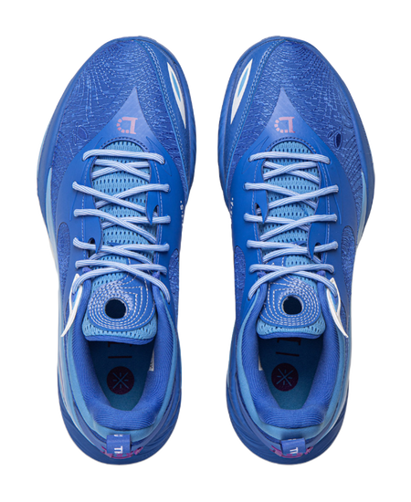 Pair of blue basketball shoes shown from the toe with lace-up and padded tongue