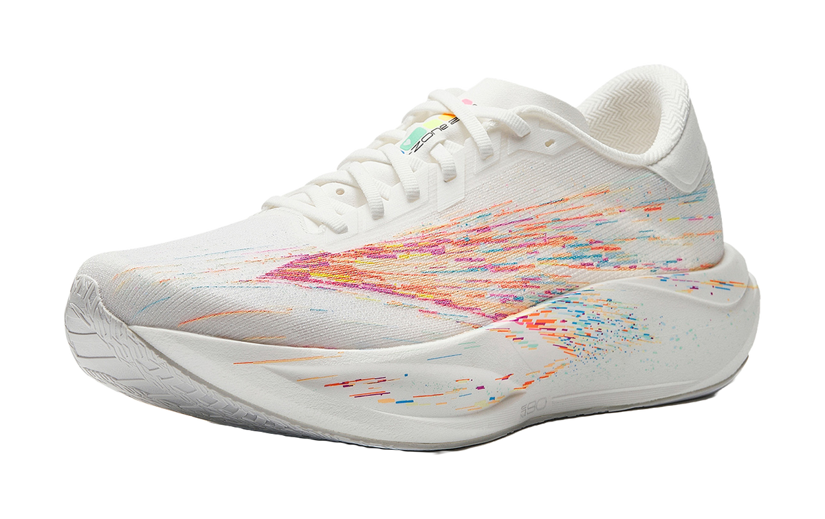White running shoe with rainbow flecked pattern, lace-up closure, cushioned sole