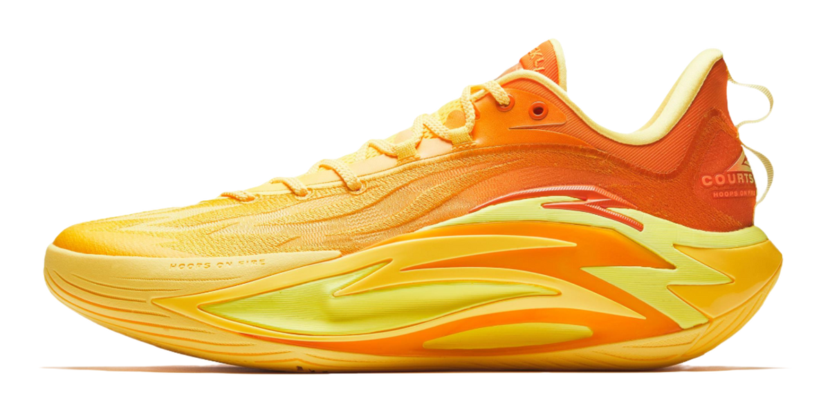 Yellow and orange basketball shoe with lime accents, lace-up upper and curved side panel.