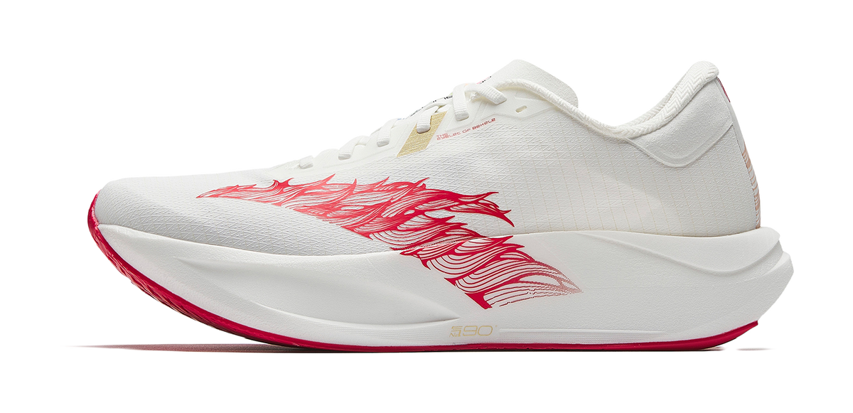 White running shoe with red dragon side graphic and gold accents