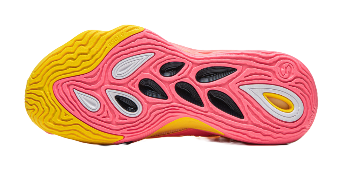 Basketball shoe outsole view with pink tread pods and yellow perimeter
