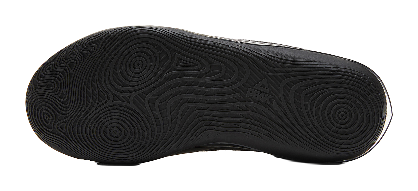 Black rubber basketball outsole with circular traction pattern