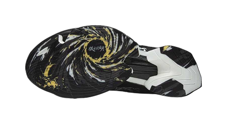 Anta low running shoe, black with white swirl side panel and abstract yellow graphic