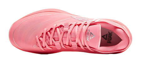 Red basketball shoe toe view with lace-up closure and padded tongue