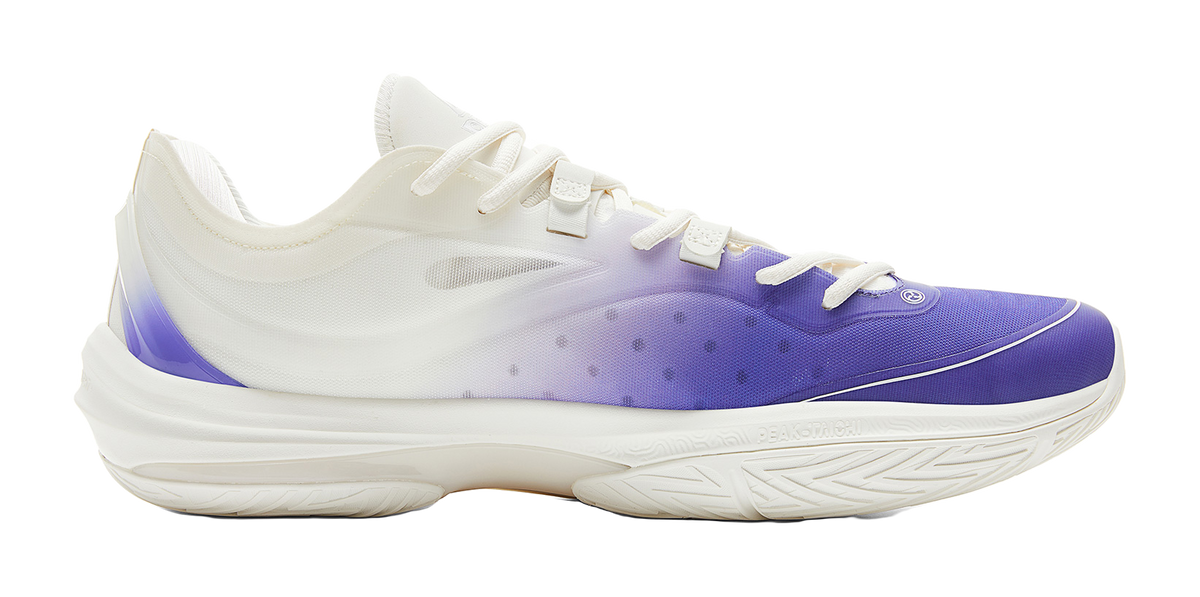 Lightweight basketball shoe, white upper with purple side panel and lace-up closure