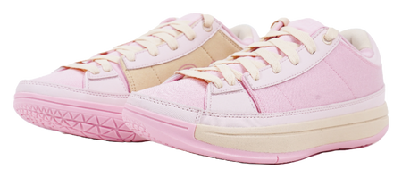 Pair of pink lace-up basketball sneakers with cream and tan accents