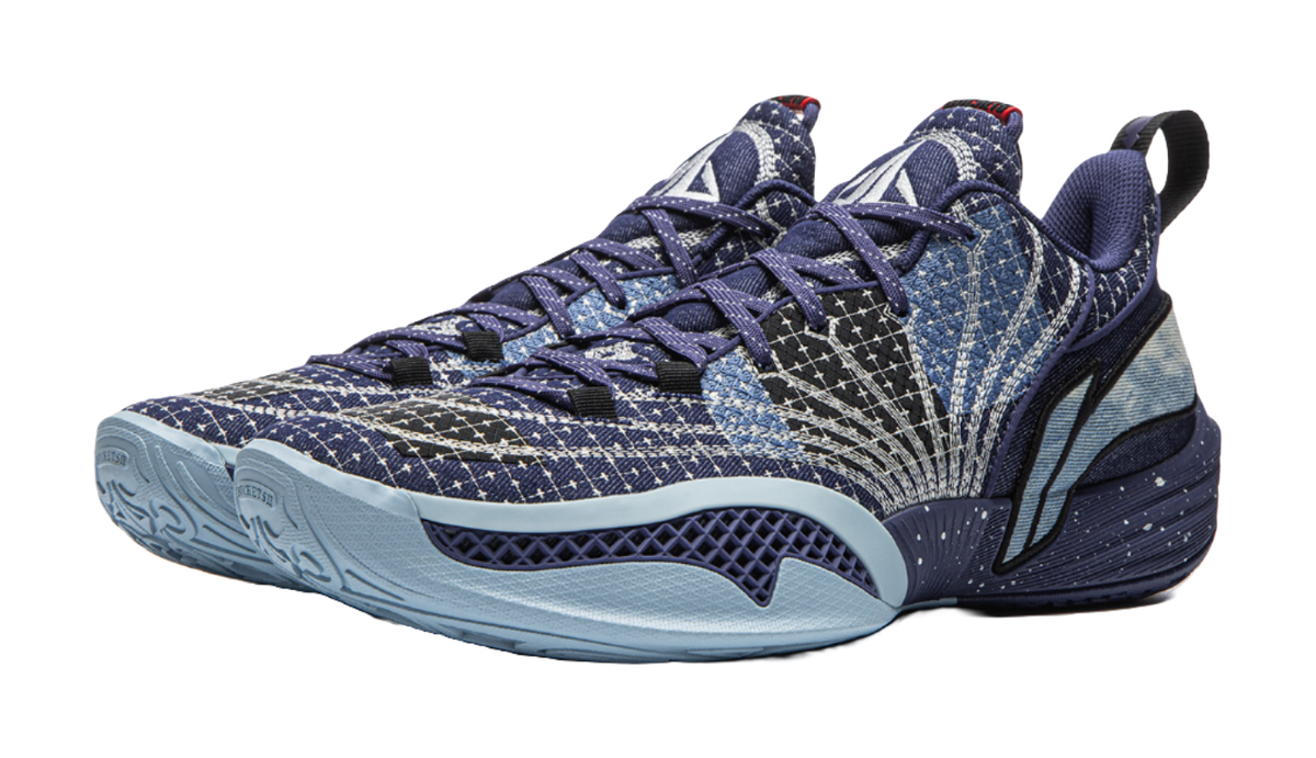 Li Ning low-top basketball shoes in deep blue, angled view with textured quarter panel