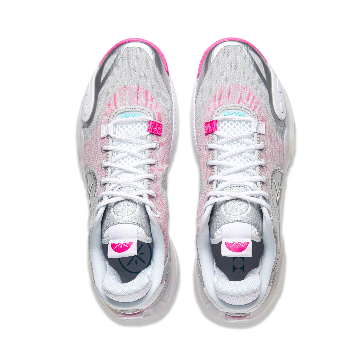 Pair of basketball shoes with laces, silver-gray uppers, pink lining, teal eyelet accents