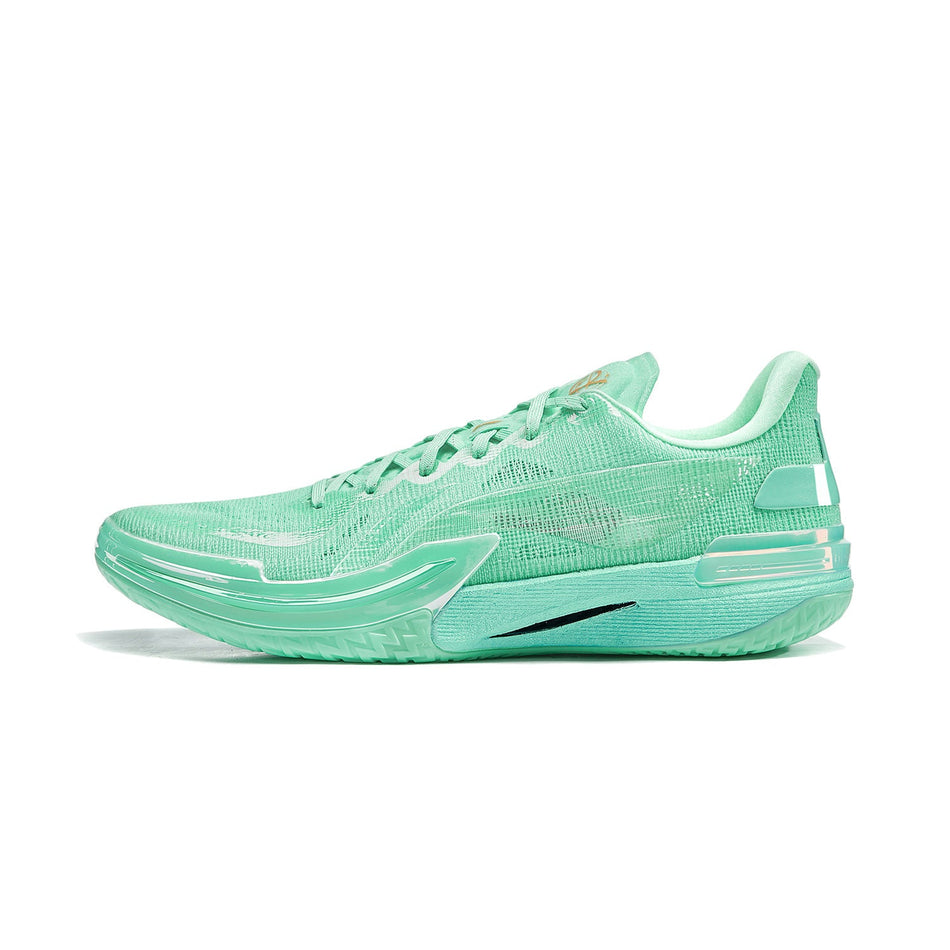 Basketball shoe with mint-green knit upper, lace-up front, and molded cushioning sole.