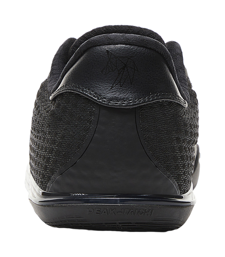 Black basketball shoe heel with logo patch and curved midsole