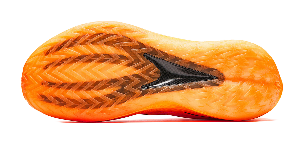 Anta Crazy 5 low-top basketball shoe outsole, orange with black tread pattern