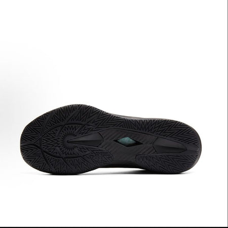 Black basketball shoe outsole with zigzag traction pattern