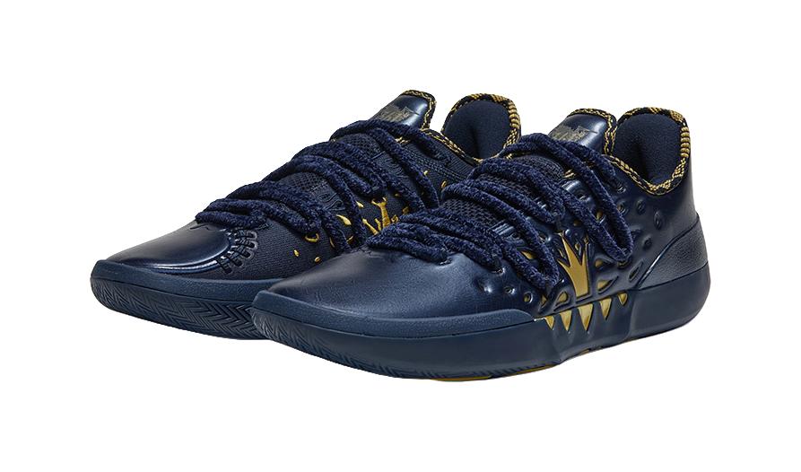 Pair of blue low-top basketball shoes with gold accents and lace-up design