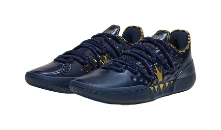 Pair of blue low-top basketball shoes with gold accents and lace-up design