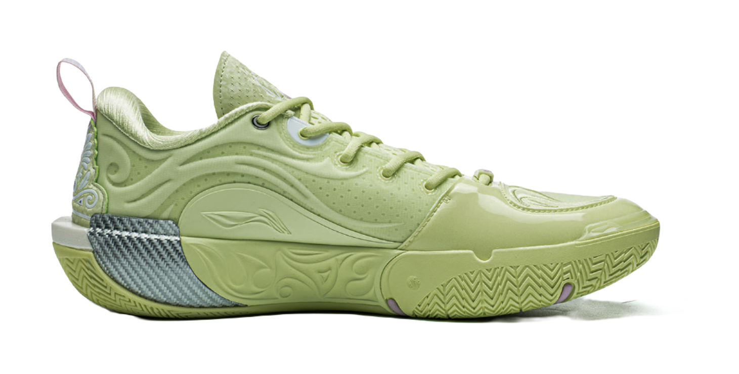 Green low-top basketball shoe, side view with textured midsole and purple logo