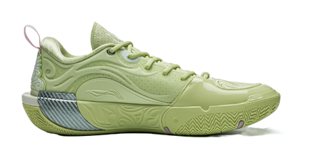Green low-top basketball shoe, side view with textured midsole and purple logo