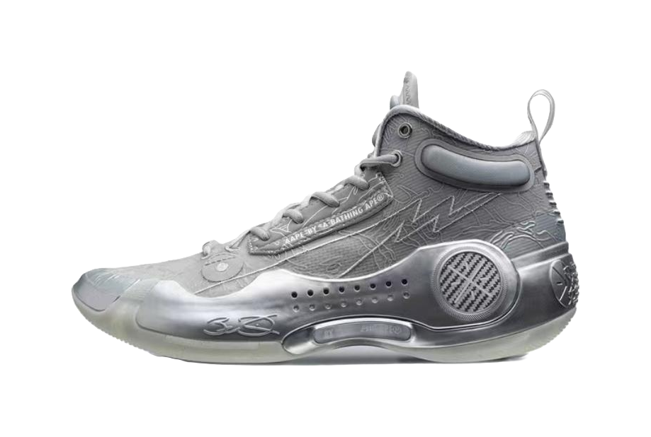 Gray mid-top basketball shoes with lace-up closure and metallic texture, perforated toe.