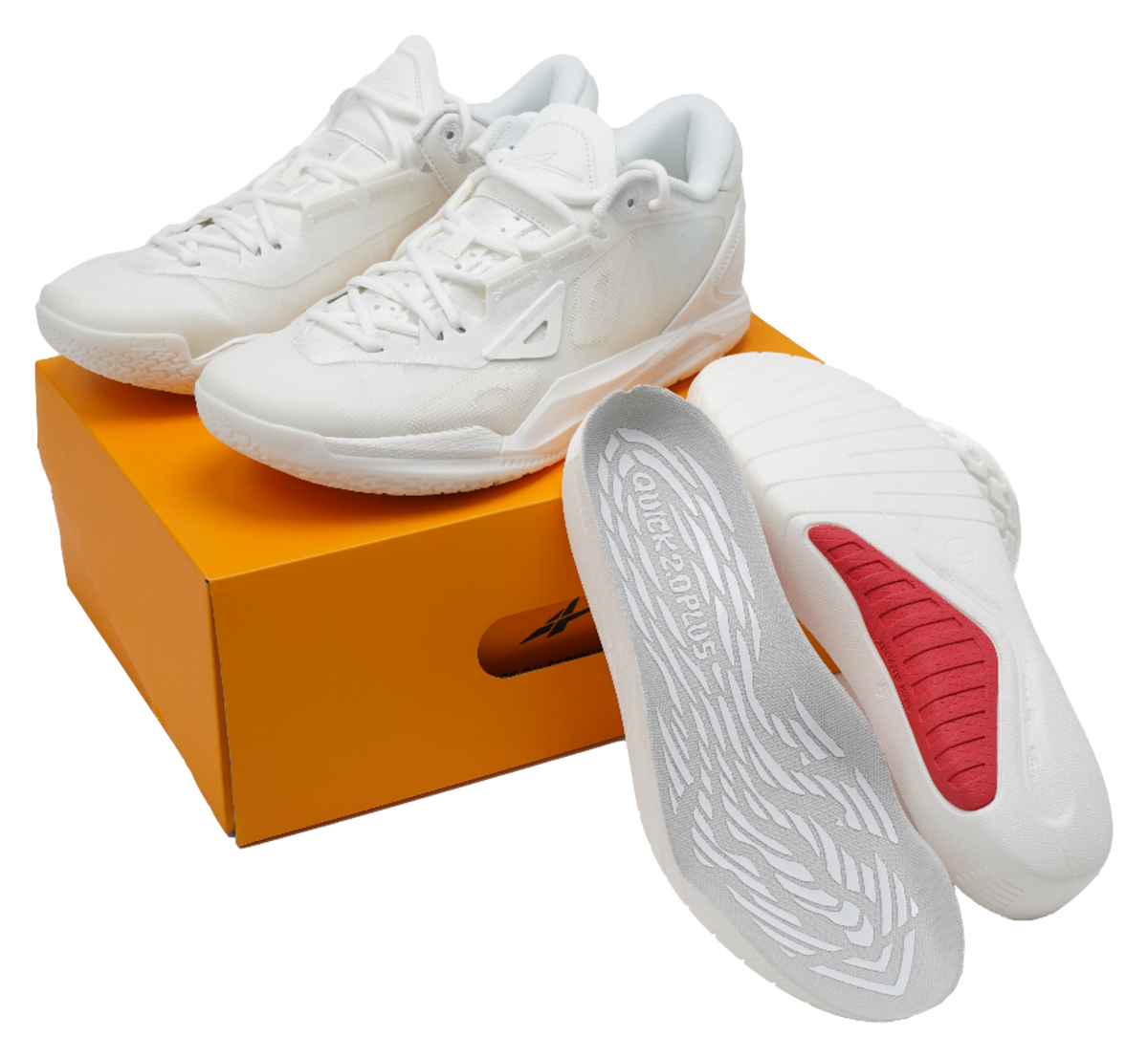 Unisex low-top basketball shoes in pure white, red outsole detail and traction grooves