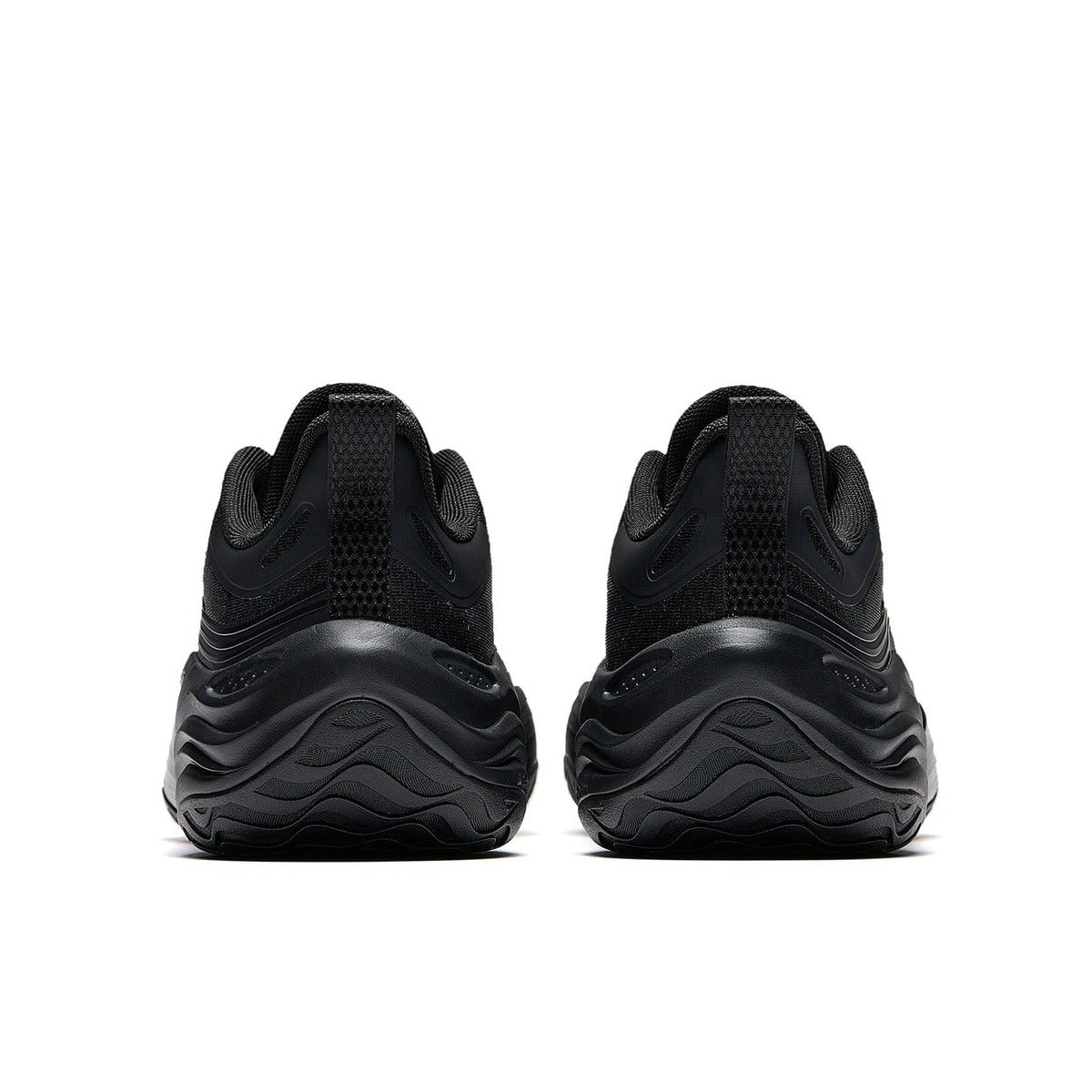 Black basketball shoe pair with textured heel counter and sculpted rubber sole