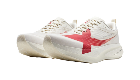 Pair of low-top running shoes, white uppers with red cross logo and cushioned sole.