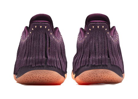 Purple basketball shoe heel view, fringe collar and grippy orange-tinted outsole