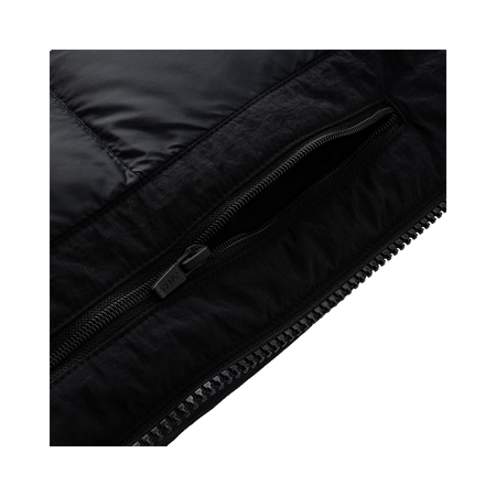 Black jacket close-up of centered zipper with black zipper pull.