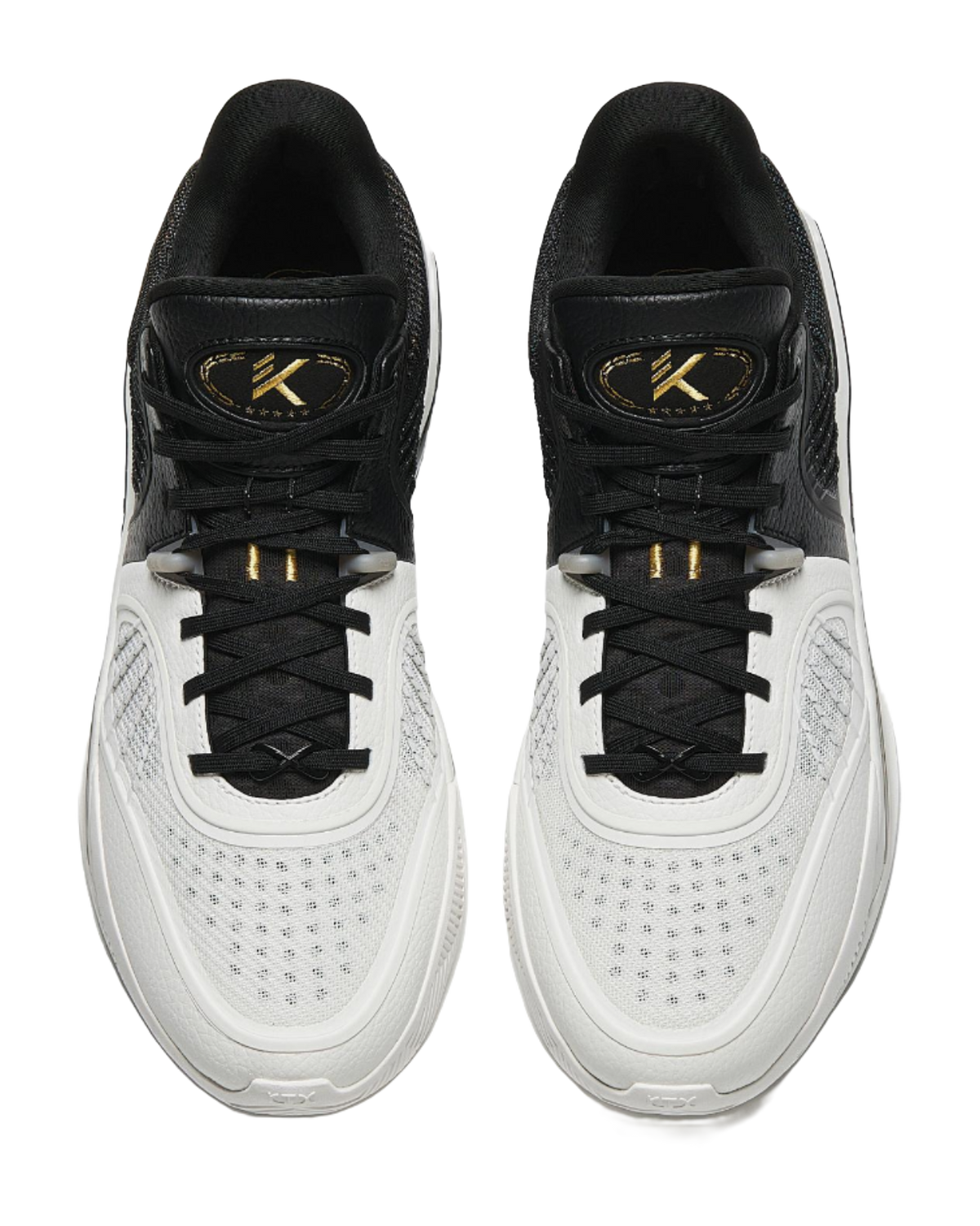 White and black high-top basketball shoes with black laces and padded collars