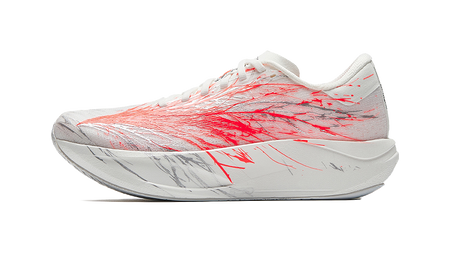 Women's low-top running shoes in white with red graphic accents and lace-up