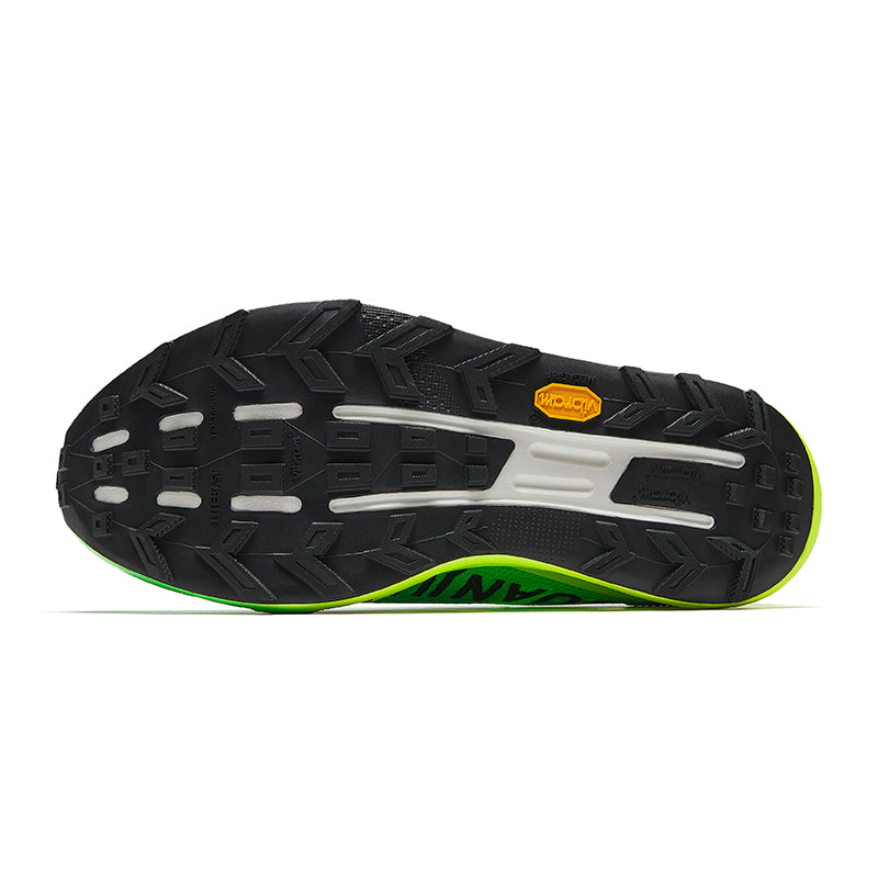 Running shoe outsole with black tread pattern and neon green side edge strip