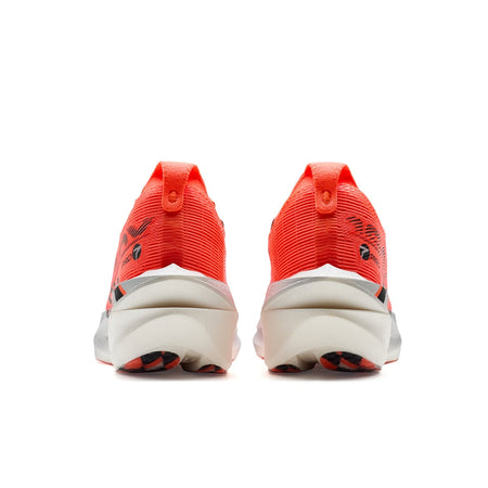 Marathon racing shoe pair viewed from heel: orange back with white midsole and grey details