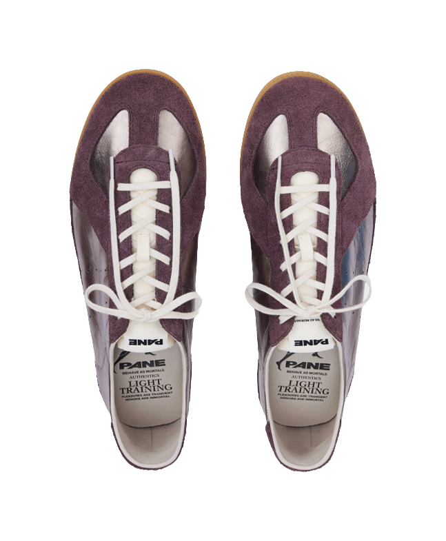 Pair of low-cut training shoes with white laces and PANE Light Training tongue label.