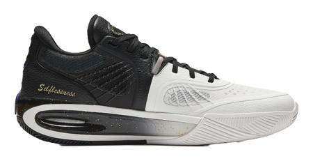 Low-top lace-up basketball shoe in black and white with gold speckled details