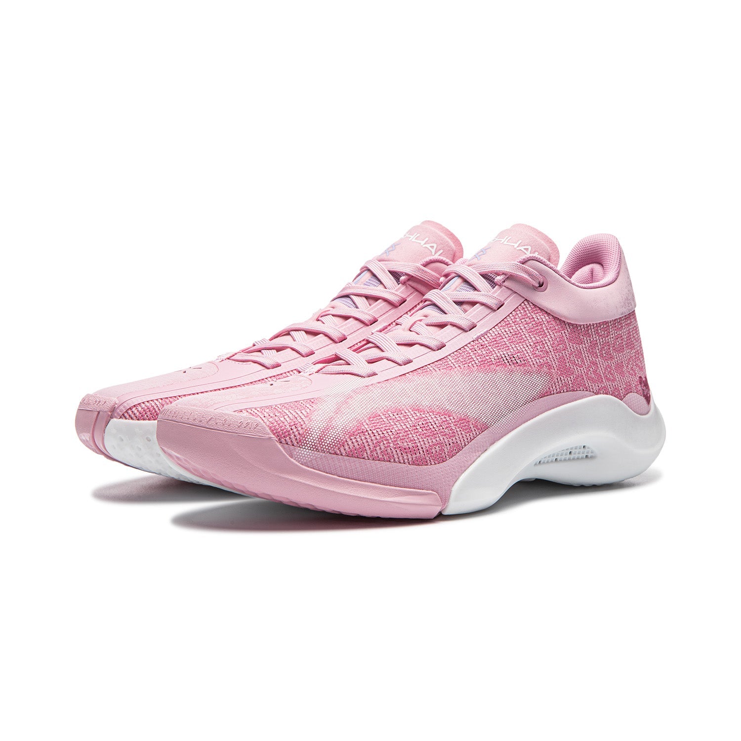Pink lace-up basketball shoe with white midsole and textured forefoot detail